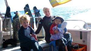 steph with kids on ning reef dream boat