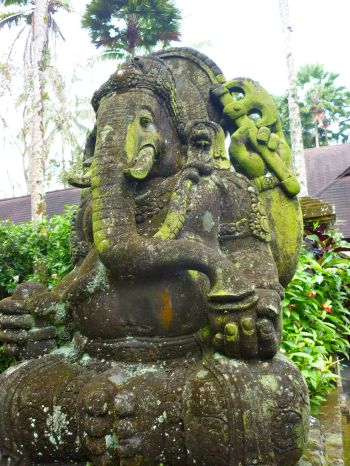 A Ganesha statue outside a jungle elephant preserve. The electric green moss transfixed me. 