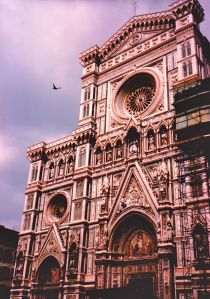 Finding my moment when I look through the viewfinder to take a photo of the Duomo in Florence and a hawk begins to circle 
