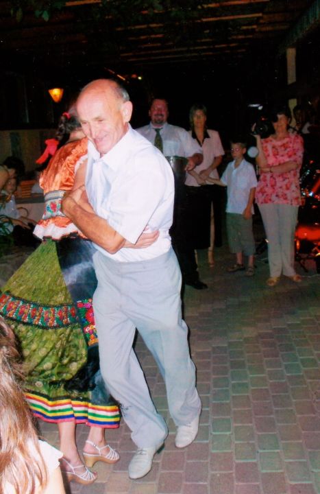 Here is Joska ripping it up on the dance floor at Kate's reception. She is wearing traditional Hungarian dress, but you could barely see her since her dad was twirling her so fast. 