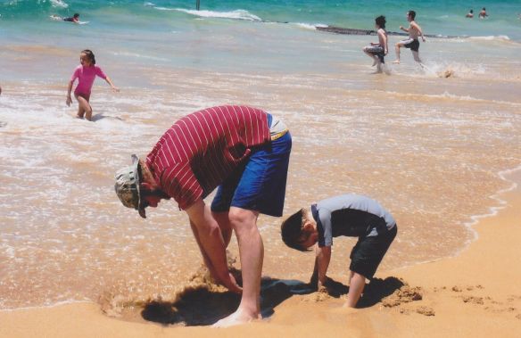 Kurt and Eddie digging a hole at Manly Beach, Australia