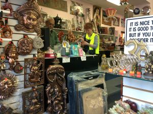 Rupert rings up a customer's purchases.