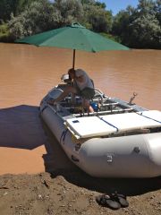 Kurt rigs our raft. LIttle do we know the adventure we have ahead. 