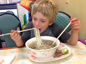 Eddie goes to town with his pho