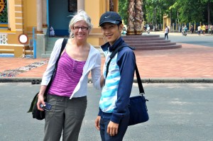 Binh and I stand outside the Cao Dai temple. It was too hot to sing. 