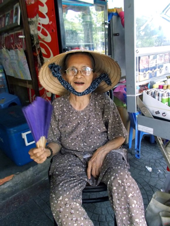 older woman with fan