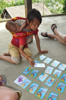 girl playing cards