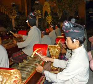 Members of the gamelan orchestra are often young Balinese musicians. 