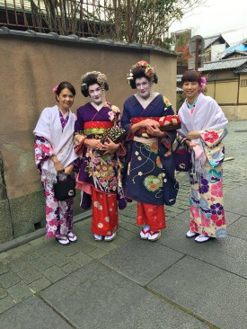 With our new friends. Suz and I are trying hard to bring dignity to the geisha image.